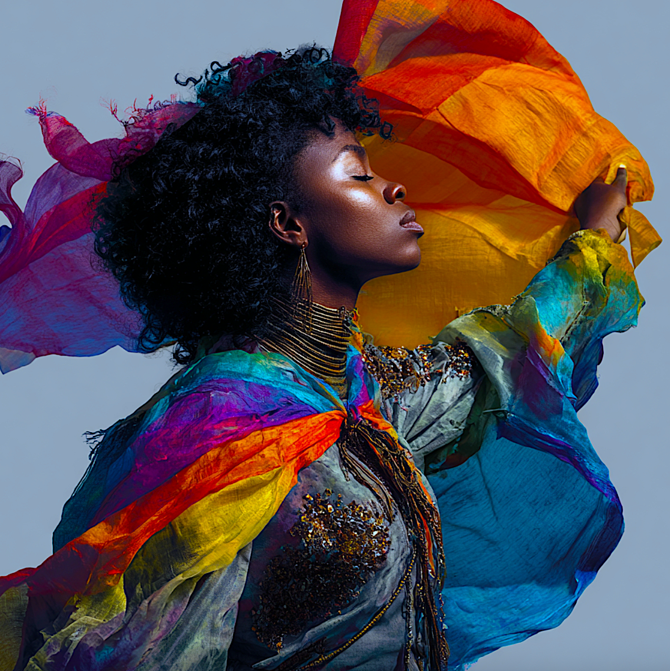 Black woman holding PrideAbility flag. Image produced using Midjourney