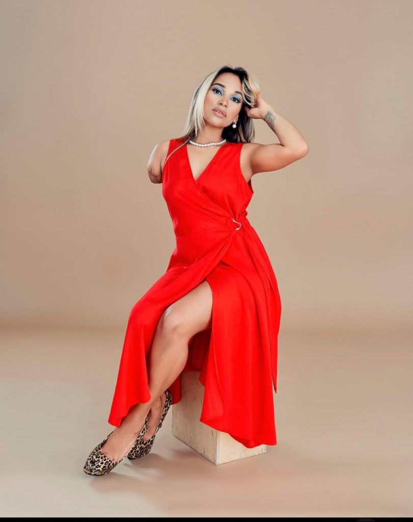 Image of Michelle Colon, wearing a red dress